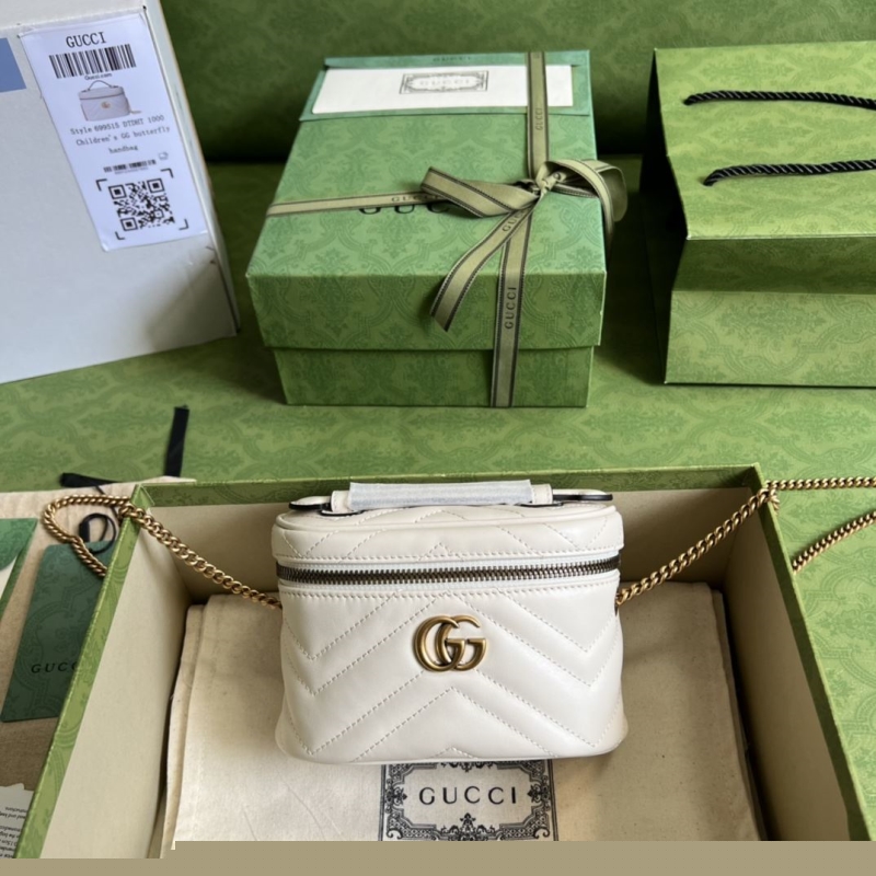 G*u*i cosmetic bags